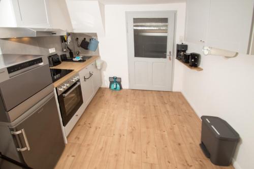 Η κουζίνα ή μικρή κουζίνα στο THEFIVE60 Apartments