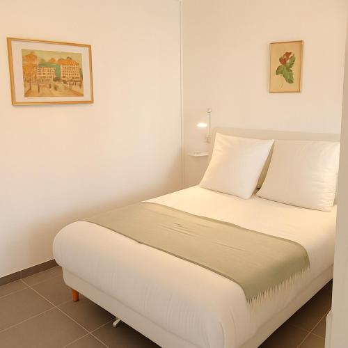 Ένα ή περισσότερα κρεβάτια σε δωμάτιο στο Appartement de charme à Digoin #1