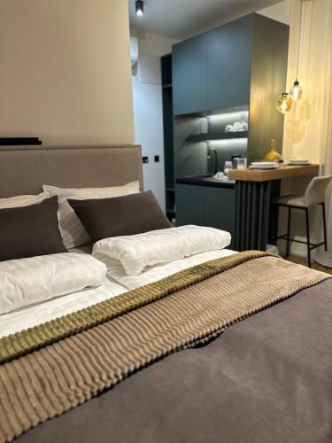 Ένα ή περισσότερα κρεβάτια σε δωμάτιο στο Four Elements Apartments