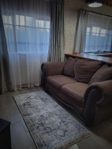 Zona de estar de Sandstone Escape Guesthouse