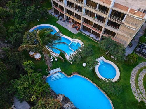 Πισίνα στο ή κοντά στο Hotel Rumi Wasi