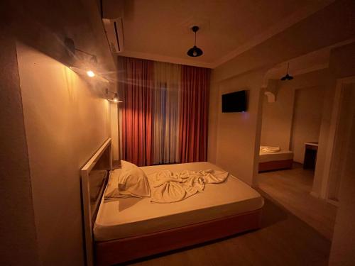 Postel nebo postele na pokoji v ubytování Best Alanya Hotel