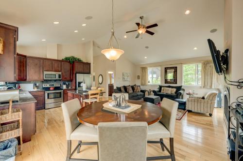 a kitchen and living room with a table and chairs at Mountain-View Eden in South Lake Tahoe