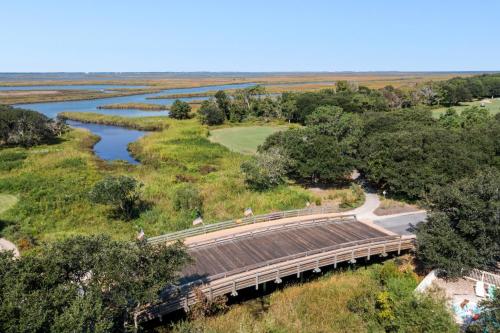an aerial view of a bridge over a river at Sailors Cove in Corolla