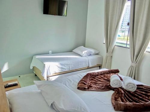 Una cama o camas en una habitación de Hotel Torre do Sal