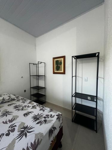 Postel nebo postele na pokoji v ubytování Pousada e hostel Costa do Sol Coroa Vermelha
