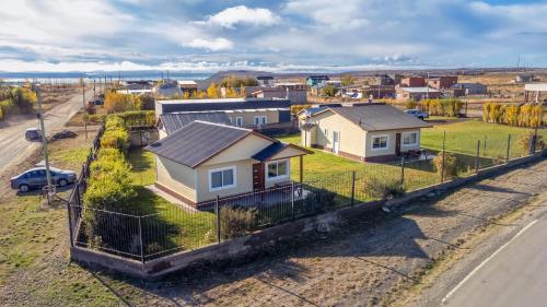 an overhead view of a house with a fence at Femiba in El Calafate