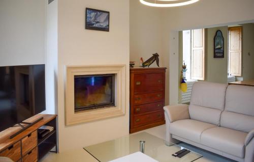 Μια τηλεόραση ή/και κέντρο ψυχαγωγίας στο Maison Près Du Port De Paimpol