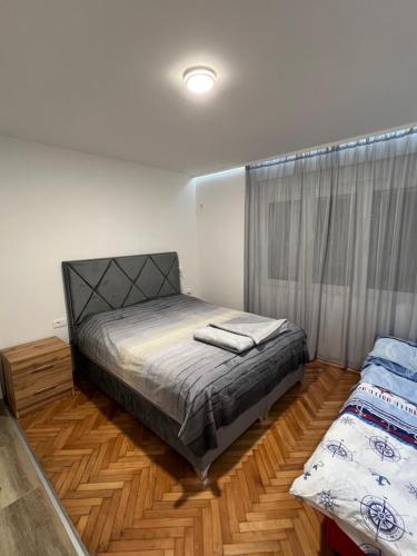 Ένα ή περισσότερα κρεβάτια σε δωμάτιο στο Apartman Ksenija
