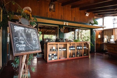 a restaurant with a chalkboard sign in a room at Hotel Salto Del Laja in Los Ángeles