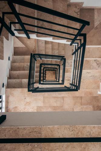 a view of a staircase in a building at Hotel B10 - Distinctive Hotel- in Playa del Carmen