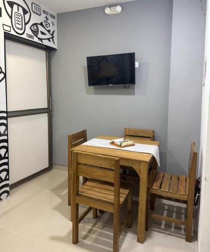 TV a/nebo společenská místnost v ubytování aparta estudio susheria