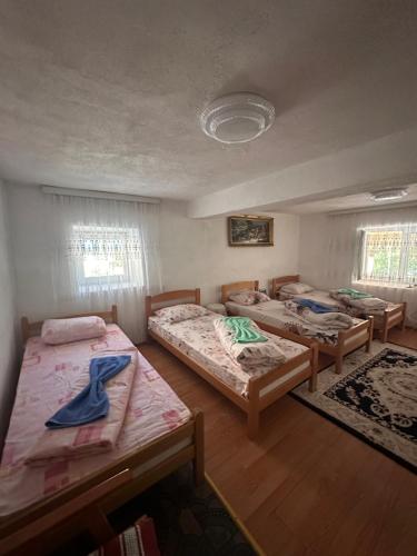 Postel nebo postele na pokoji v ubytování Guest House GURI