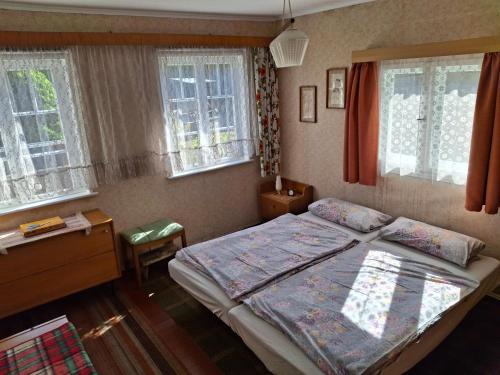 Katil atau katil-katil dalam bilik di Ferienhaus Karow