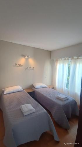 Ένα ή περισσότερα κρεβάτια σε δωμάτιο στο La Via Hostel