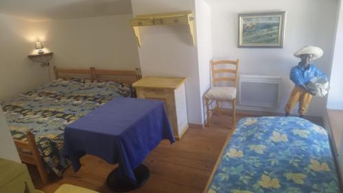 Gîte Chez Papyにあるベッド