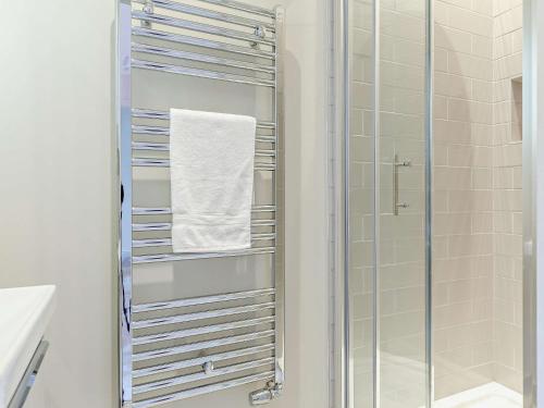 a towel rack in a bathroom with a shower at 4 Bed in Fowey 82152 in Fowey