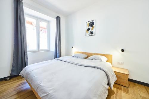 TH 101 Appartement F3 spacieux 1 à 5 pers 1er étageにあるベッド