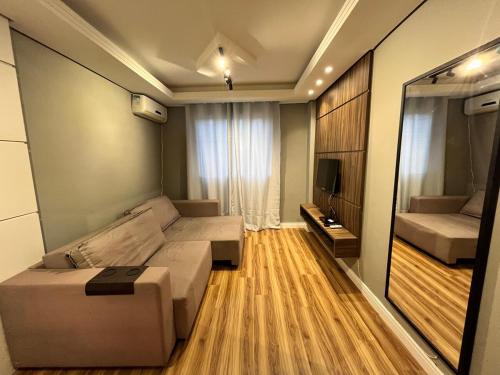 Zona de estar de 1-Apto 1 dorm Barra Sul com VAGA