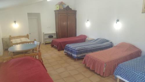 Gîte Chez Papyにあるベッド