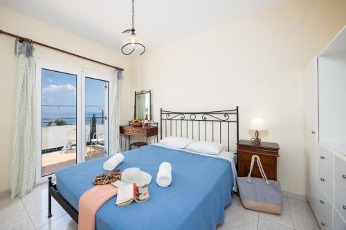 Ένα ή περισσότερα κρεβάτια σε δωμάτιο στο Skala Villa Blue
