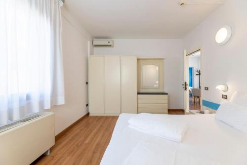 Hi Hotels Riva del Gardaにあるベッド