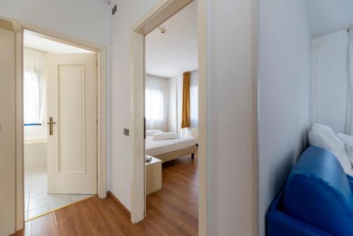 Hi Hotels Riva del Gardaにあるベッド
