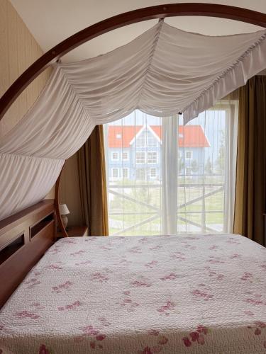 Una cama o camas en una habitación de Kurenas