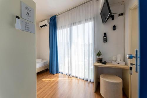 Voodi või voodid majutusasutuse Hi Hotels Riva del Garda toas