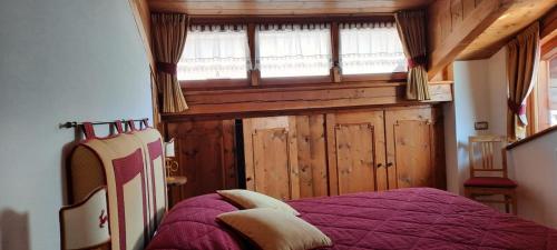 Un pat sau paturi într-o cameră la Casa Falco