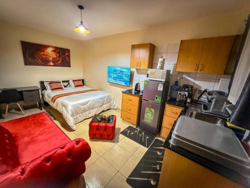 Η κουζίνα ή μικρή κουζίνα στο Khamoe Studio Apartment