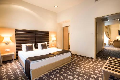 Buda Castle Hotel Budapestにあるベッド