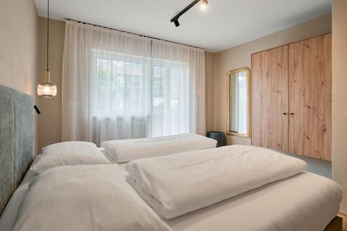 Una cama o camas en una habitación de Art Residence Josefshof