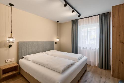 Una cama o camas en una habitación de Art Residence Josefshof