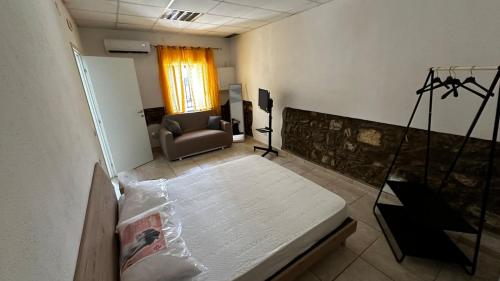 Postel nebo postele na pokoji v ubytování Piano Terra nel Borgo a circa 5 min dal mare