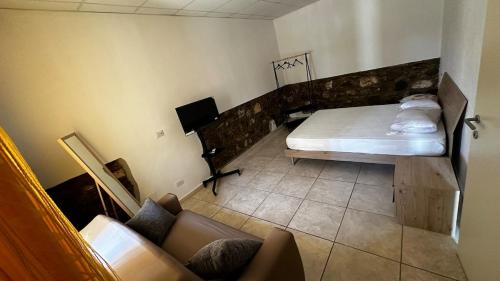 Postel nebo postele na pokoji v ubytování Piano Terra nel Borgo a circa 5 min dal mare