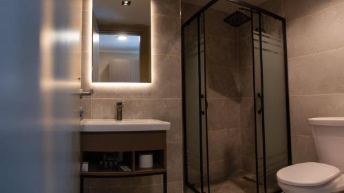 Koupelna v ubytování Max Suite Hotel