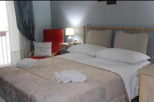 Postel nebo postele na pokoji v ubytování Carpe Diem House