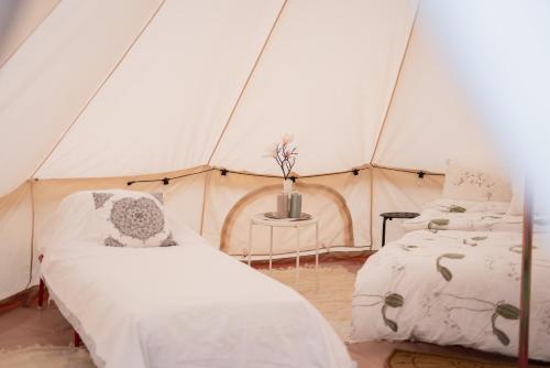 Voodi või voodid majutusasutuse Ulvsby Ranch Western Camp toas