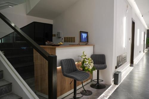 Μια τηλεόραση ή/και κέντρο ψυχαγωγίας στο Rateel Apartments 2