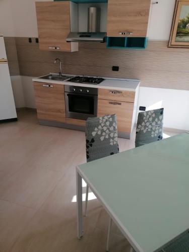 Η κουζίνα ή μικρή κουζίνα στο Casa Luys, San Donato di Lecce