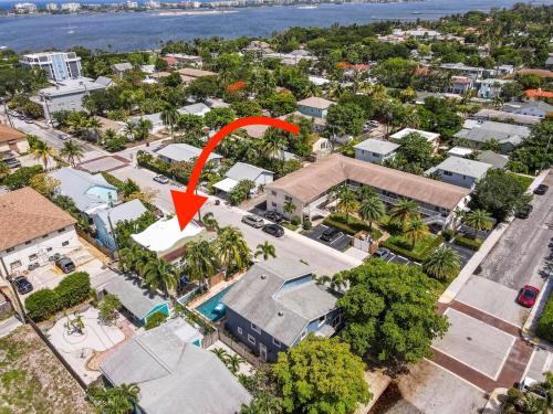 an aerial view of a house with a red arrow at Historic Home near the water - perfectly walkable spot! in Lake Worth