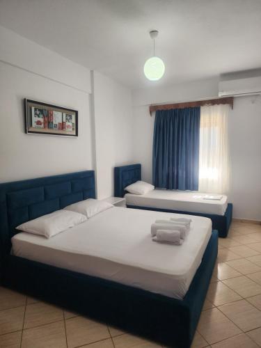 Katil atau katil-katil dalam bilik di Apartament Luani