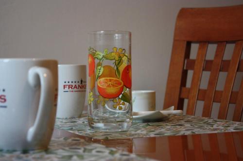 a glass of water sitting on top of a table at Bridge To Venice in Venice