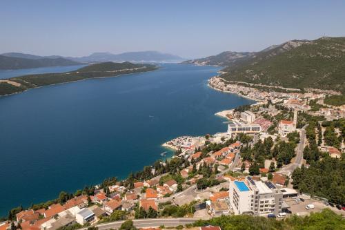 an aerial view of a town next to a lake at Gabriel in Neum