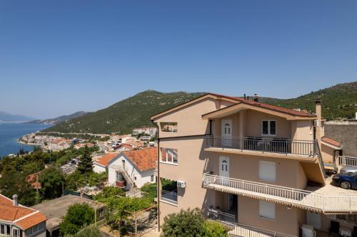 a view of a building with a view of the water at Gabriel in Neum