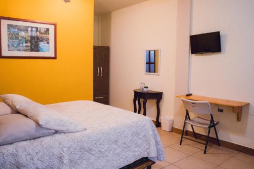 TV a/nebo společenská místnost v ubytování Hotel-Villas JABEL TINAMIT