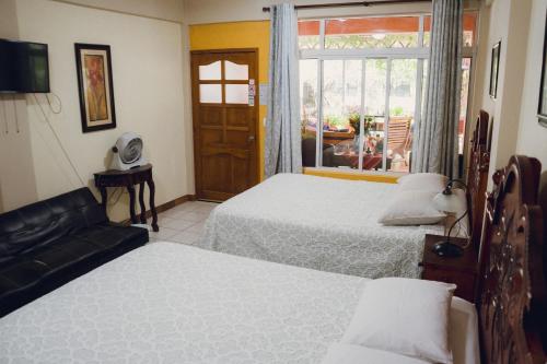 Postel nebo postele na pokoji v ubytování Hotel-Villas JABEL TINAMIT