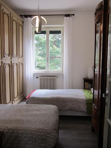 Postel nebo postele na pokoji v ubytování Appartamento Maglio