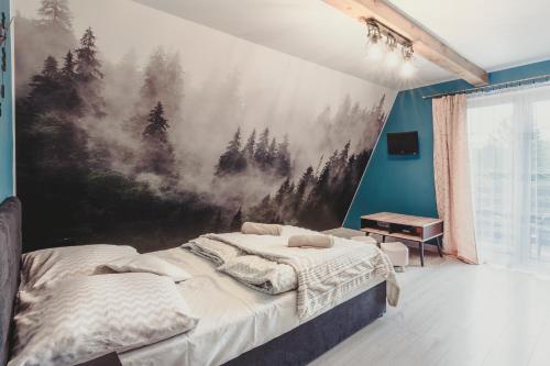 Katil atau katil-katil dalam bilik di Apartament na strychu u Babci